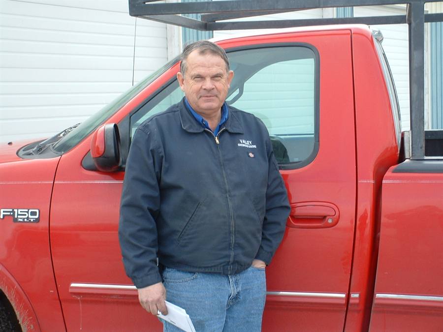 Valley Overhead Door owner with the service truck in Idaho Falls